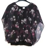 Svart semi-transparent topp med blommor